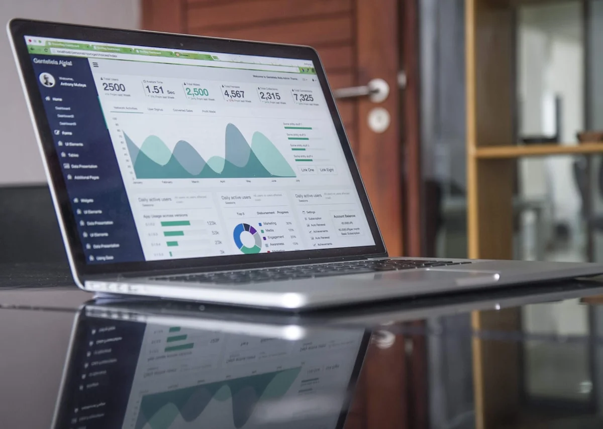 Laptop displaying analytics during a business review