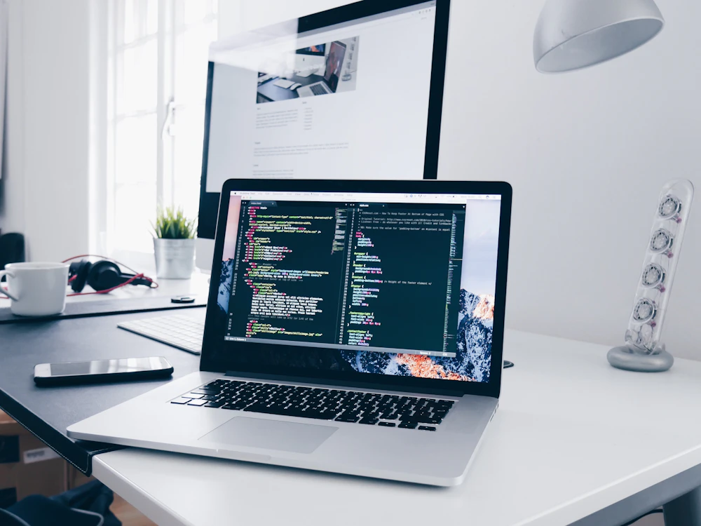 Laptop and desktop workspace for web development